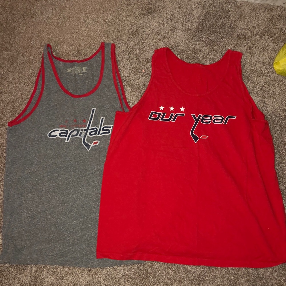 Two men’s capitals tanks
